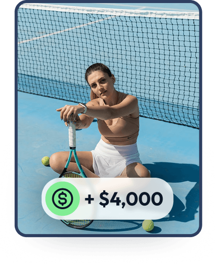 lady on shorts on lawn tennis pitch